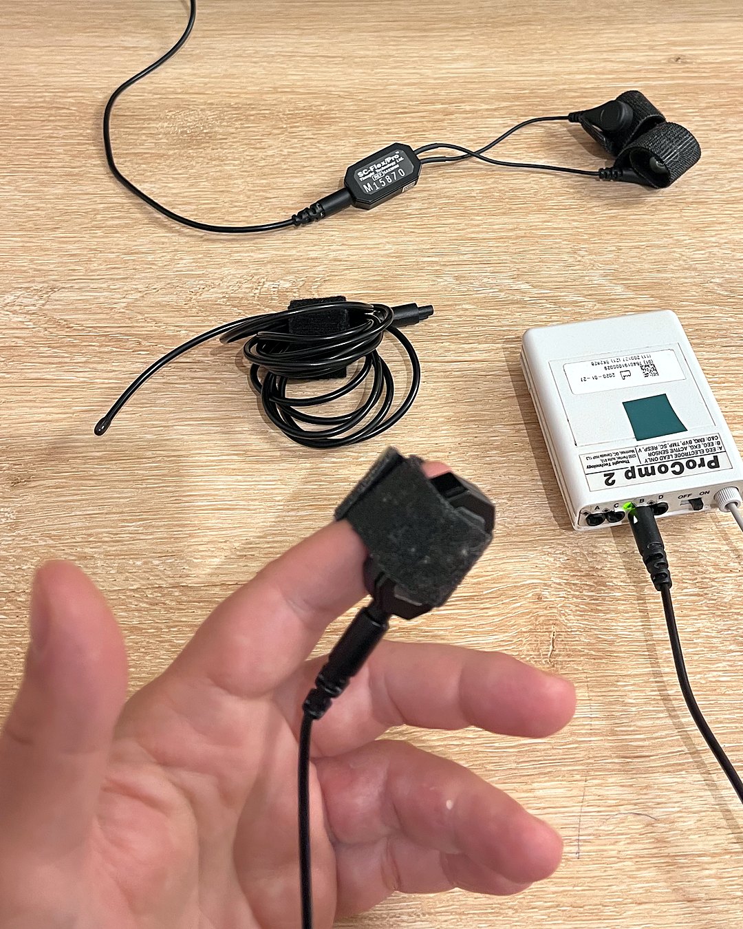 Pulse sensor placed on the fingertip, connected to the biofeedback encoder